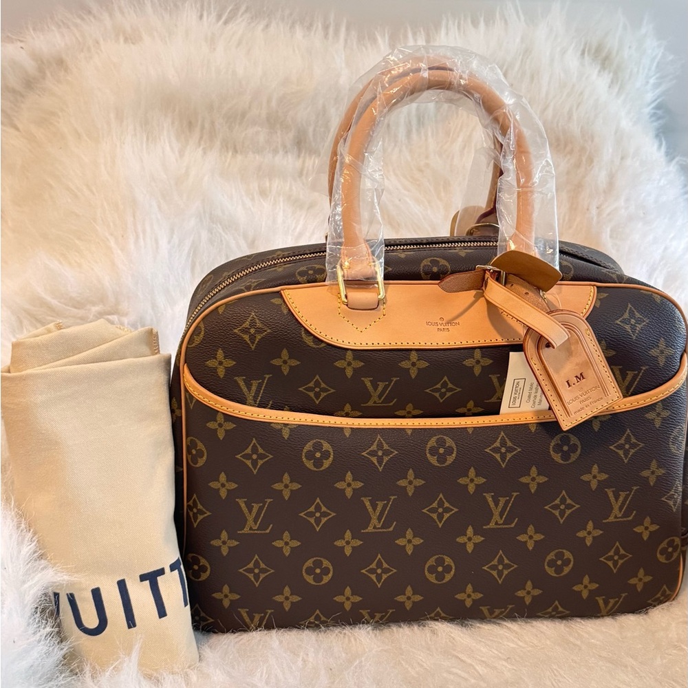 Louis Vuitton  Deauville Monogram Canvas with Gold Accents